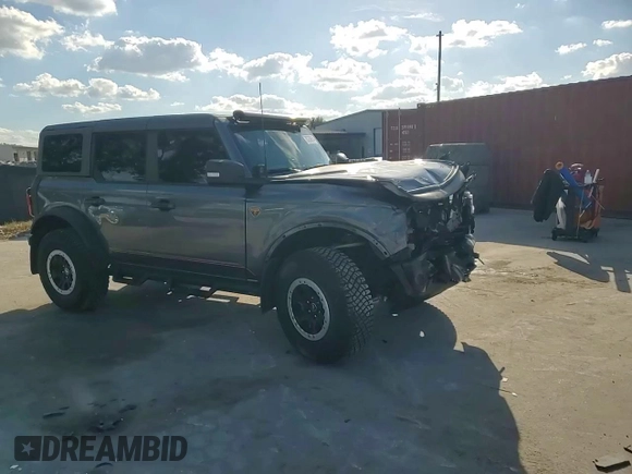 2022 Ford Bronco with VIN 1FMEE5DH1NLB82717, listed as a Copart auction lot 83230614 with 21,593 mi miles and Salvage Title. Bid and sale history available at DreamBid. Image 12.