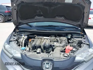 2015 Honda Fit LX with VIN 3HGGK5H55FM724750, listed as a IAAI auction lot 42282137 with 32,696 mi miles and . Bid and sale history available at DreamBid. Image 10.