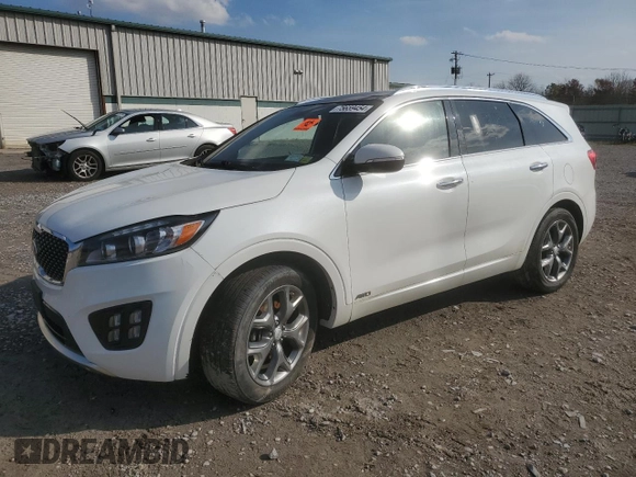 2016 Kia Sorento SXL z VIN 5XYPKDA16GG102852, wystawiony jako Copart lot #75659454 z przebiegiem Nie podano mil oraz Nie do naprawy • Non repairable. Historia ofert i sprzedaży dostępna na DreamBid. Obrazek 1.