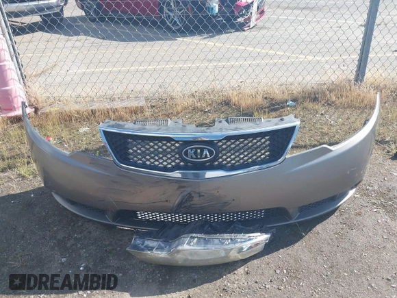 2010 Kia Forte EX with VIN KNAFU4A28A5229372, listed as a IAAI auction lot 41911118 with 166,084 mi miles. Bid and sale history available at carsss.com. Image 12.