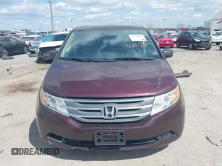 2013 Honda Odyssey LX with VIN 5FNRL5H28DB058401, listed as a IAAI auction lot 42050892 with 221,016 mi miles and . Bid and sale history available at carsss.com. Image 12.