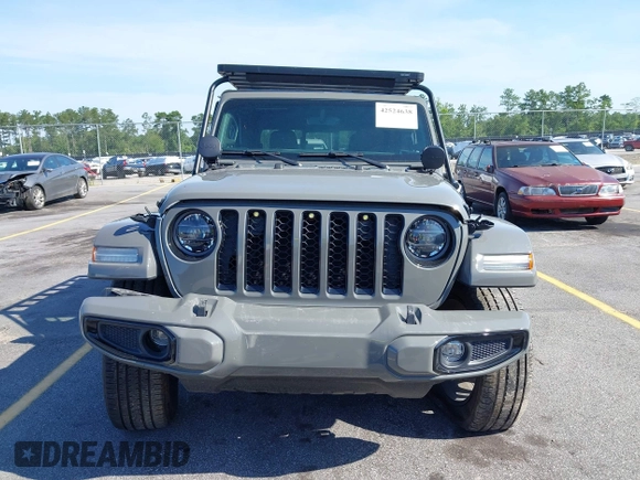 2022 Jeep Gladiator High Altitude with VIN 1C6HJTFG6NL152173, listed as a IAAI auction lot 42524638 with 17,148 mi miles and . Bid and sale history available at DreamBid. Image 13.