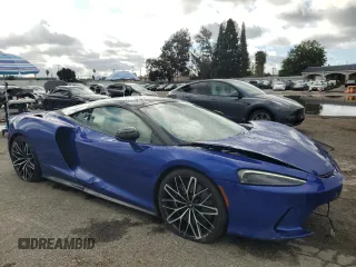 2023 McLaren GT z VIN SBM22GCA9PW003039, wystawiony jako Copart lot #47143765 z przebiegiem 2775 mil mil oraz Szkody całkowita. Historia ofert i sprzedaży dostępna na DreamBid. Obrazek 4.