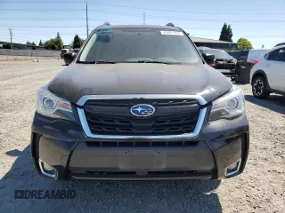 2017 Subaru Forester Touring z VIN JF2SJGWCXHH805812, wystawiony jako Copart lot #61081795 z przebiegiem 99 017 mil mil oraz Szkoda całkowita • Salvage title. Historia ofert i sprzedaży dostępna na DreamBid. Obrazek 5.