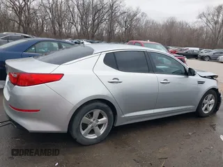 2014 Kia Optima LX z VIN KNAGM4A74E5476622, wystawiony jako IAAI lot #41701835 z przebiegiem 193 086 mil mil oraz . Historia ofert i sprzedaży dostępna na DreamBid. Obrazek 13.