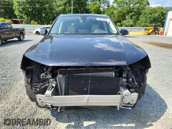 2018 Audi Q7 Premium Plus with VIN WA1LHAF71JD018852, listed as a Copart auction lot 60779375 with 84,760 mi miles and Salvage title. Bid and sale history available at DreamBid. Image 5.