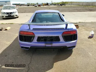 2017 Audi R8 z VIN WUAKBAFX2H7903141, wystawiony jako Copart lot #46552054 z przebiegiem 20 096 mil mil oraz . Historia ofert i sprzedaży dostępna na DreamBid. Obrazek 6.