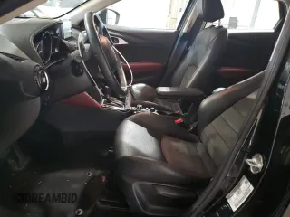 2017 Mazda CX-3 Grand Touring z VIN JM1DKFD71H0141595, wystawiony jako Copart lot #54377305 z przebiegiem 60 907 mil mil oraz Szkody całkowita. Historia ofert i sprzedaży dostępna na DreamBid. Obrazek 7.