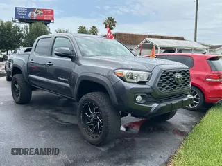 2021 Toyota Tacoma SR with VIN 3TMCZ5AN5MM375251, listed as a Copart auction lot 63281705 with 67,486 mi miles and Salvage title. Bid and sale history available at DreamBid. Image 1.