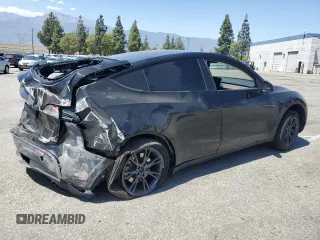 2024 Tesla Model Y Long Range with VIN 7SAYGDEE0RF123793, listed as a Copart auction lot 57177305 with 20,053 mi miles and Salvage title. Bid and sale history available at DreamBid. Image 3.