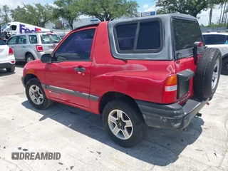 2002 Chevrolet Tracker z VIN 2CNBE18C926911755, wystawiony jako IAAI lot #42452154 z przebiegiem 129 098 mil mil oraz . Historia ofert i sprzedaży dostępna na DreamBid. Obrazek 3.