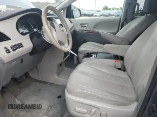 2014 Toyota Sienna XLE with VIN 5TDYK3DC2ES520840, listed as a Copart auction lot 59672295 with 194,143 mi miles and Salvage title. Bid and sale history available at DreamBid. Image 7.