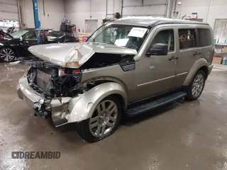 2007 Dodge Nitro SLT z VIN 1D8GU58K57W673543, wystawiony jako IAAI lot #41574634 z przebiegiem 64 286 mil mil oraz . Historia ofert i sprzedaży dostępna na DreamBid. Obrazek 2.