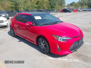2016 Scion tC z VIN JTKJF5C78GJ019207, wystawiony jako IAAI lot #40513386 z przebiegiem 68 260 mil mil oraz . Historia ofert i sprzedaży dostępna na DreamBid. Obrazek 1.