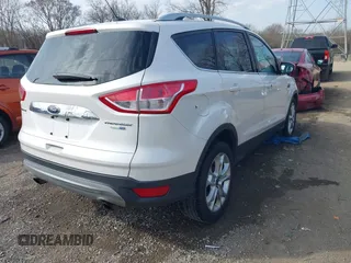 2015 Ford Escape Titanium with VIN 1FMCU9J98FUC76491, listed as a IAAI auction lot 41790638 with 158,196 mi miles and . Bid and sale history available at DreamBid. Image 4.