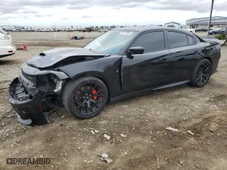 2017 Dodge Charger R/T Scat Pack with VIN 2C3CDXGJ9HH595905, listed as a Copart auction lot 50777885 with 97,846 mi miles and Salvage Title. Bid and sale history available at carsss.com. Image 1.