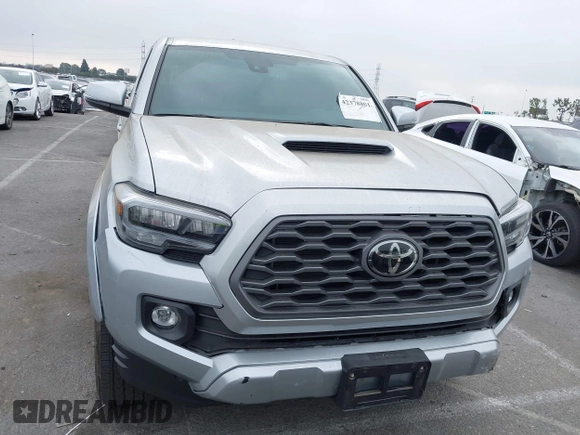 2022 Toyota Tacoma SR with VIN 3TYRZ5CN9NT022492, listed as a IAAI auction lot 42378801 with 9,312 mi miles and . Bid and sale history available at DreamBid. Image 12.