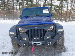 2018 Jeep Wrangler Unlimited Sport S with VIN 1C4HJXDNXJW265764, listed as a IAAI auction lot 41359018 with 50,941 mi miles. Bid and sale history available at carsss.com. Image 13.