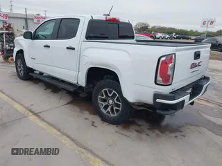 2021 GMC Canyon 4WD AT4 w/Leather with VIN 1GTG6FEN6M1154040, listed as a IAAI auction lot 41209527 with 29,484 mi miles. Bid and sale history available at carsss.com. Image 3.