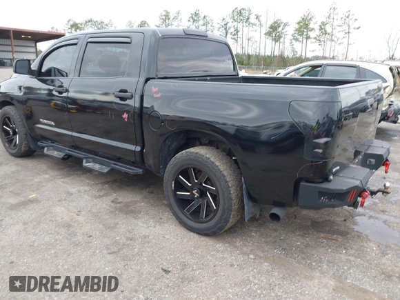 2012 Toyota Tundra 4WD Truck with VIN 5TFDW5F14CX268378, listed as a IAAI auction lot 41412922 with 148,763 mi miles. Bid and sale history available at carsss.com. Image 3.