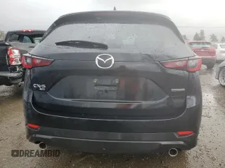 2023 Mazda CX-5 2.5 S Preferred Package with VIN JM3KFBCM0P0285740, listed as a Copart auction lot 44848915 with 21,582 mi miles and Salvage Title. Bid and sale history available at carsss.com. Image 6.