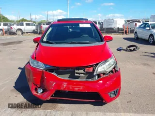 2015 Honda Fit EX-L z VIN 3HGGK5H84FM761279, wystawiony jako IAAI lot #40911141 z przebiegiem 82 217 mil mil oraz . Historia ofert i sprzedaży dostępna na DreamBid. Obrazek 13.