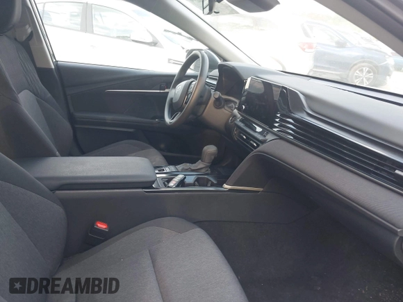 2025 Toyota Camry LE with VIN 4T1DAACKXSU541257, listed as a IAAI auction lot 42052246 with 13,585 mi miles and . Bid and sale history available at DreamBid. Image 5.
