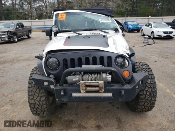 2007 Jeep Wrangler Unlimited X with VIN 1J4GA39147L207549, listed as a Copart auction lot 47291165 with 141,325 mi miles and Salvage title. Bid and sale history available at DreamBid. Image 5.
