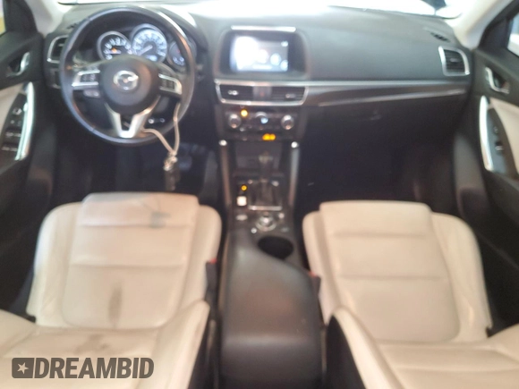 2016 Mazda CX-5 Grand Touring with VIN JM3KE4DY0G0813499, listed as a Copart auction lot 54174805 with 116,709 mi miles and Clean Title. Bid and sale history available at carsss.com. Image 8.