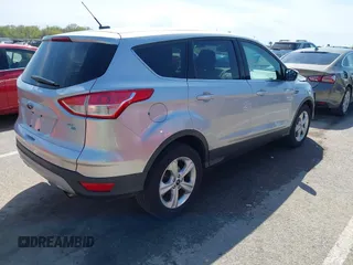 2016 Ford Escape SE with VIN 1FMCU9G98GUA10333, listed as a IAAI auction lot 42021490 with 128,973 mi miles. Bid and sale history available at carsss.com. Image 4.