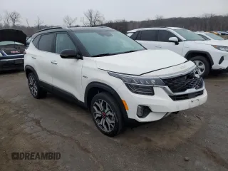 2022 Kia Seltos SX with VIN KNDETCA23N7299979, listed as a Copart auction lot 42940095 with 27,315 mi miles and Salvage title. Bid and sale history available at DreamBid. Image 4.