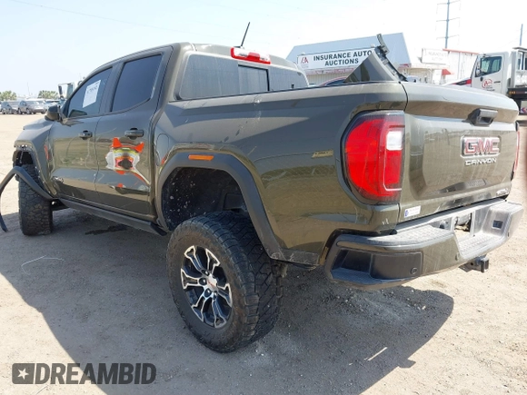 2023 GMC Canyon 4WD AT4 with VIN 1GTP6DEK5P1231432, listed as a IAAI auction lot 41785102 with 33,154 mi miles and . Bid and sale history available at carsss.com. Image 3.