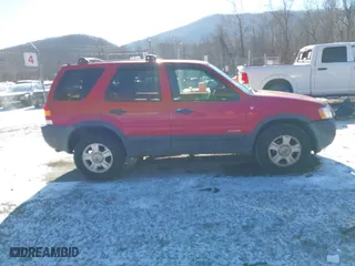 2001 Ford Escape XLT with VIN 1FMYU04131KB51488, listed as a IAAI auction lot 41363166 with 327,580 mi miles. Bid and sale history available at carsss.com. Image 13.