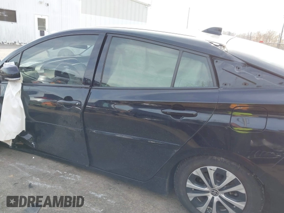 2020 Toyota Prius LE z VIN JTDKARFPXL3155639, wystawiony jako IAAI lot #41845001 z przebiegiem Nie podano mil oraz . Historia ofert i sprzedaży dostępna na DreamBid. Obrazek 14.