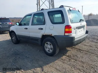 2003 Ford Escape XLS Popular with VIN 1FMYU92183KB46619, listed as a IAAI auction lot 40695244 with 0 mi miles. Bid and sale history available at carsss.com. Image 3.