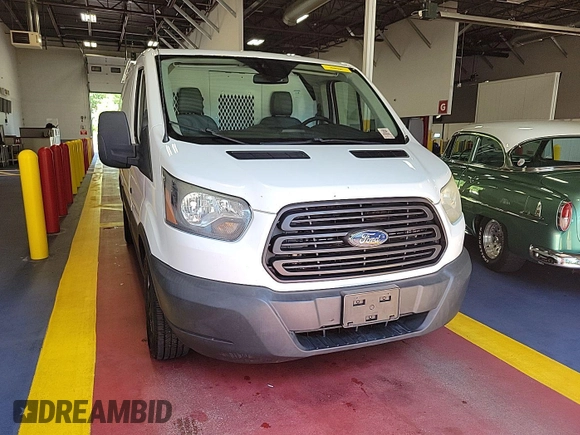 2015 Ford Transit Cargo with VIN 1FTNE1YM7FKB29922, listed as a IAAI auction lot 42842343 with 217,184 mi miles and . Bid and sale history available at DreamBid. Image 6.
