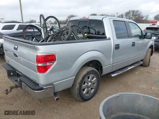 2013 Ford F-150 XL with VIN 1FTEW1CM4DKE15793, listed as a IAAI auction lot 41517360 with 172,311 mi miles. Bid and sale history available at carsss.com. Image 4.