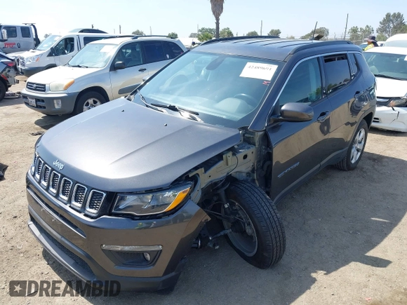 2019 Jeep Compass Latitude with VIN 3C4NJDBB8KT729491, listed as a IAAI auction lot 42489691 with 73,022 mi miles and . Bid and sale history available at DreamBid. Image 2.