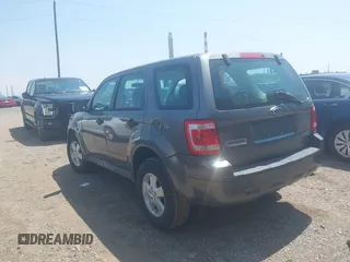 2009 Ford Escape XLS z VIN 1FMCU02729KC33600, wystawiony jako IAAI lot #42469557 z przebiegiem 185 605 mil mil oraz . Historia ofert i sprzedaży dostępna na DreamBid. Obrazek 3.