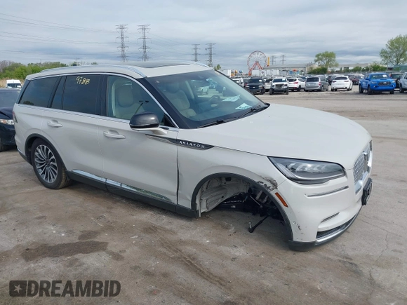 2023 Lincoln Aviator Reserve z VIN 5LM5J7WC0PGL29563, wystawiony jako IAAI lot #42219788 z przebiegiem 4 861 mil mil oraz . Historia ofert i sprzedaży dostępna na DreamBid. Obrazek 1.