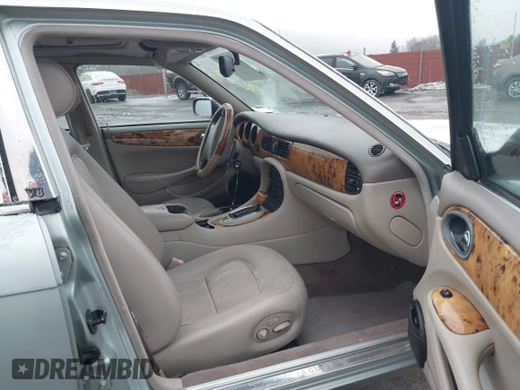1998 Jaguar XJ with VIN SAJHN1242WC819689, listed as a IAAI auction lot 41148530 with 60,143 mi miles and . Bid and sale history available at DreamBid. Image 5.