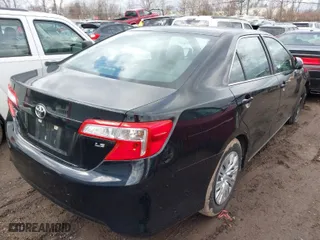 2012 Toyota Camry L with VIN 4T1BF1FK2CU040059, listed as a IAAI auction lot 41696195 with 144,697 mi miles. Bid and sale history available at carsss.com. Image 4.