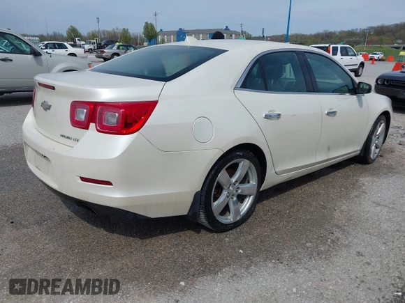 2013 Chevrolet Malibu LTZ with VIN 1G11J5SX6DF348664, listed as a IAAI auction lot 41994207 with 202,008 mi miles and . Bid and sale history available at DreamBid. Image 4.