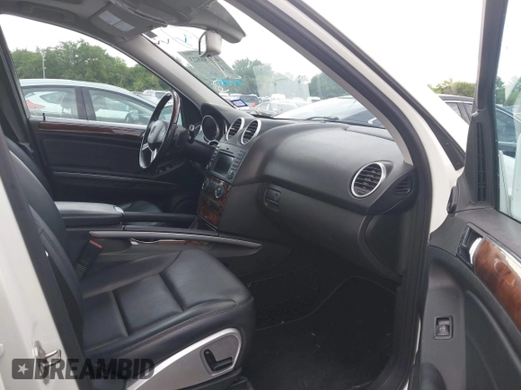 2011 Mercedes-Benz M 350 with VIN 4JGBB5GB5BA627082, listed as a IAAI auction lot 42036823 with 164,098 mi miles and . Bid and sale history available at DreamBid. Image 5.