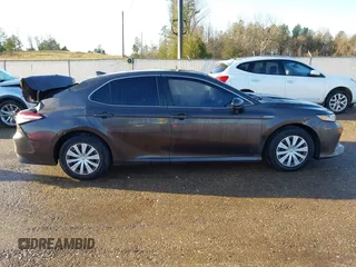 2019 Toyota Camry Hybrid LE z VIN 4T1B31HK4KU516123, wystawiony jako IAAI lot #41733410 z przebiegiem 98 273 mil mil oraz . Historia ofert i sprzedaży dostępna na DreamBid. Obrazek 13.