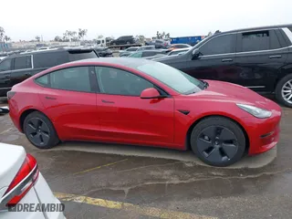 2023 Tesla Model 3 with VIN 5YJ3E1EA2PF476140, listed as a IAAI auction lot 41789189 with 33,435 mi miles. Bid and sale history available at carsss.com. Image 13.