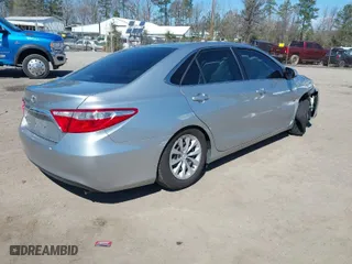 2015 Toyota Camry XLE with VIN 4T4BF1FK1FR448062, listed as a IAAI auction lot 41882344 with 121,490 mi miles. Bid and sale history available at carsss.com. Image 4.