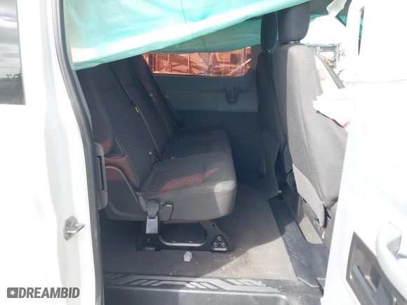 2016 Ford Transit Wagon XL with VIN 1FBZX2ZM5GKB32047, listed as a IAAI auction lot 41710159 with 321,489 mi miles. Bid and sale history available at carsss.com. Image 8.