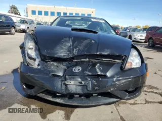 2004 Toyota Celica GT with VIN JTDDR32T140180241, listed as a Copart auction lot 77031284 with 194,669 mi miles and Clean Title. Bid and sale history available at DreamBid. Image 5.