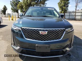 2024 Cadillac XT6 FWD Premium Luxury with VIN 1GYKPCRS7RZ737726, listed as a Copart auction lot 47471965 with 7,974 mi miles and Salvage Title. Bid and sale history available at carsss.com. Image 5.